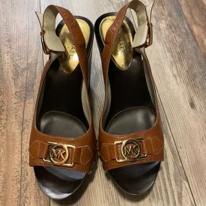 Michael Kors Leather wedge heel with gold MK emblem